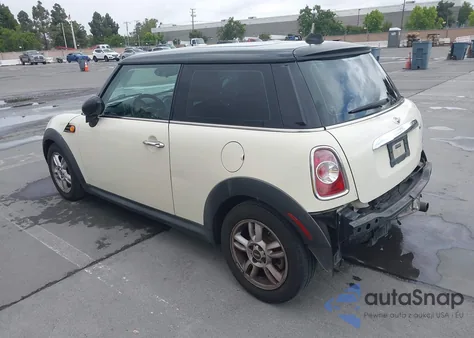 2011 Mini Cooper z USA, uszkodzony, nr VIN WMWSU3C57BT096603